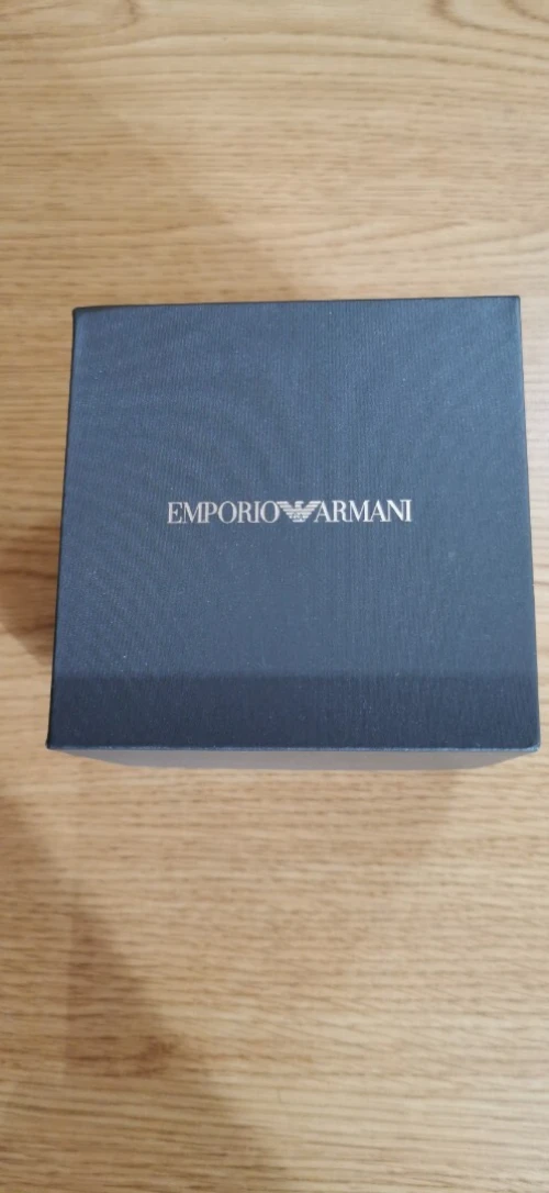 Emporio Armani World Explorer watch (AR11589) features a distinctive green and black "Sprite" GMT bezel