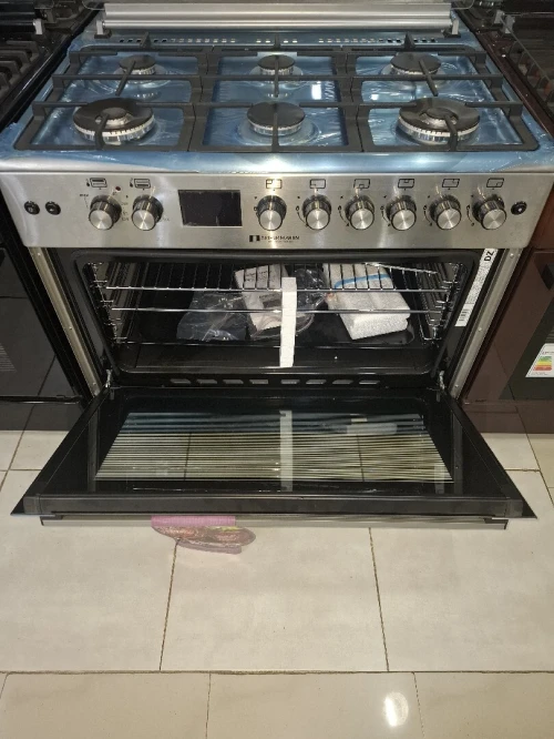 Cuisinière Arthur Martin  6 feux gaz electrique inox double wok