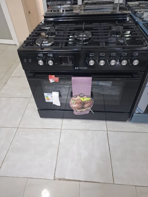 Cuisinière Arthur Martin  noir gaz electrique  double wok