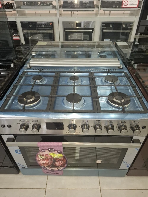 Cuisinière Arthur Martin  6 feux gaz electrique inox double wok