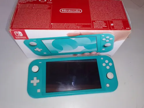 Nintendo switch lite flashée avec sa boit