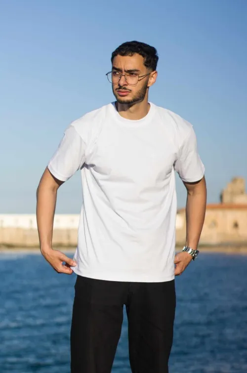 Tshirt Oversize 1  Tshirt = 1400 DA 2 Tshirts =2500  DA  ال num 