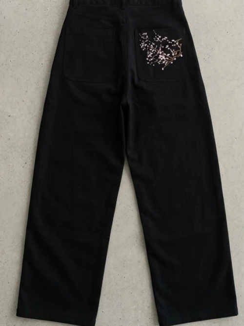 Black jeans and long sleeve shirt