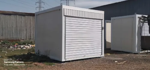 Kiosque commercial neuf avec rideau galvanisé électrique