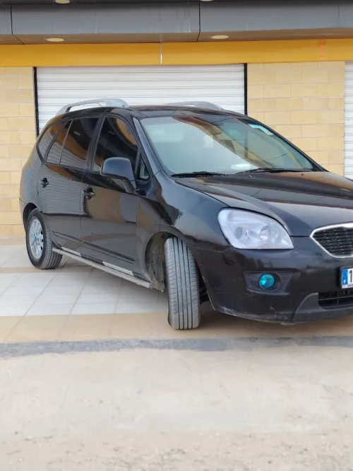 Kia Carens 2012 7 place