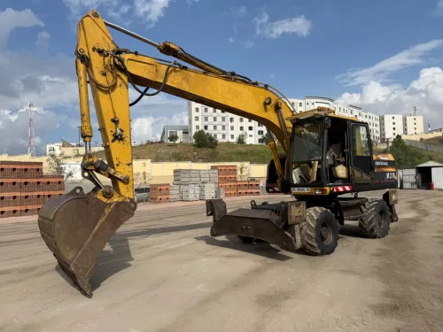 Caterpillar M318 1998