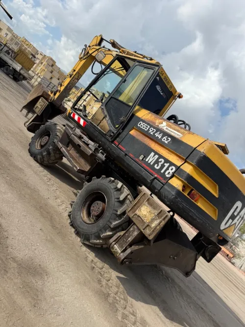 Caterpillar M318 1998