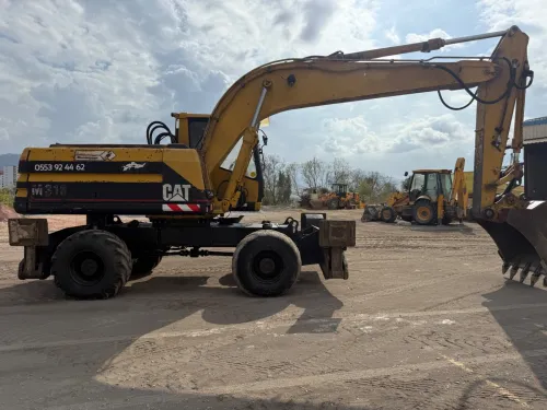 Caterpillar M318 1998