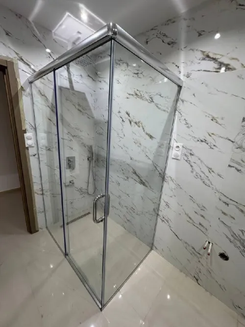 Rampe d'escalier inox et cabine douche