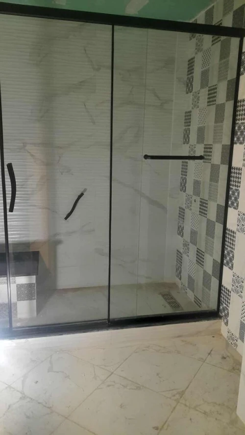 Rampe d'escalier inox et cabine douche