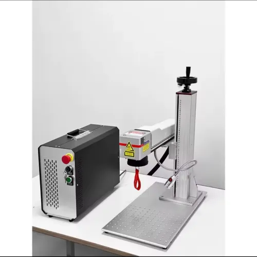  مكينة الطبع و تقطيع على الذهب و الفضة machine gravure laser 