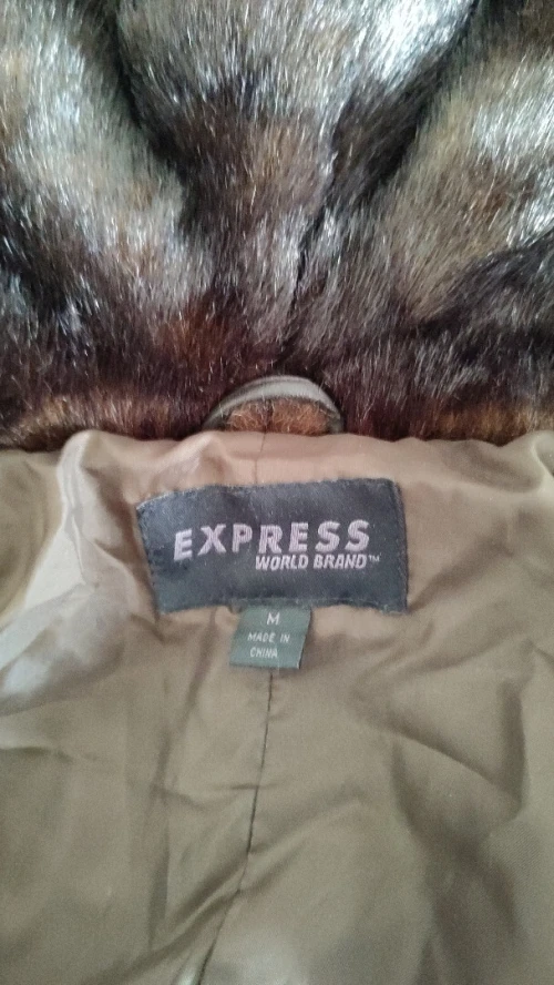Manteau court en fourrure / Neuf