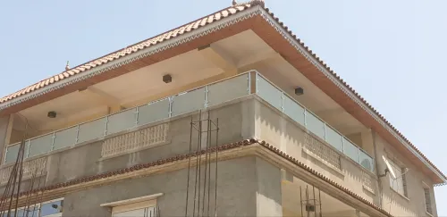 RAMPES D'ESCALIER EN INOX ET VERRE 