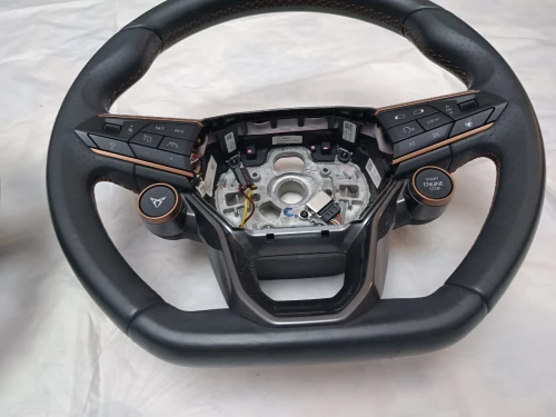Volant Cupra et visière rétroviseur latéral