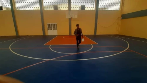 Revêtement de sol salle sportif  Polyuréthane collé sur place 