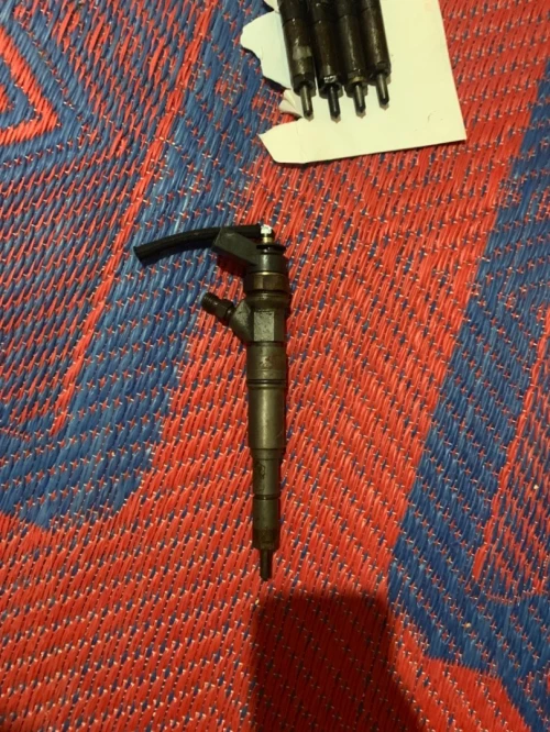 Injecteur bmw 