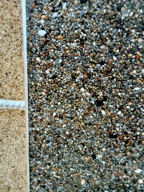 Revêtement et traitement de façade en mignonette et Grain de marbre 