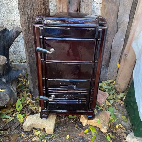 poele a bois en fonte emaille مدفأة حطب فونت ماي وداخل حجر ناري