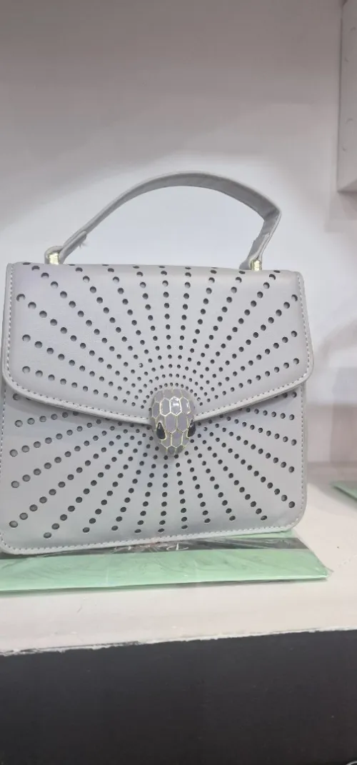 Prada chanelle Gutti Valentino hermes luis vitton