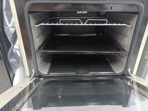 Promo cuisinière Thomson ventilé 4 feux inox fonte-wok TABOUNA avec afficheur