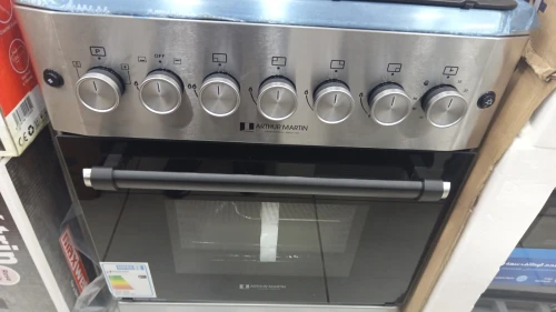 Promo cuisinière Arthur Martin Gaz Gaz4 feux fonte inox ventilé catalyseur 