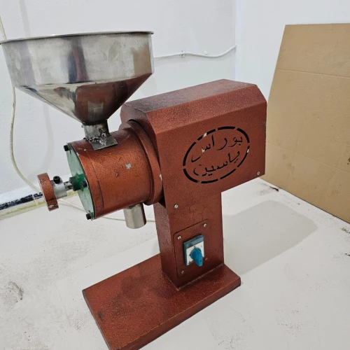 Machine de conditionnement de café en capsule