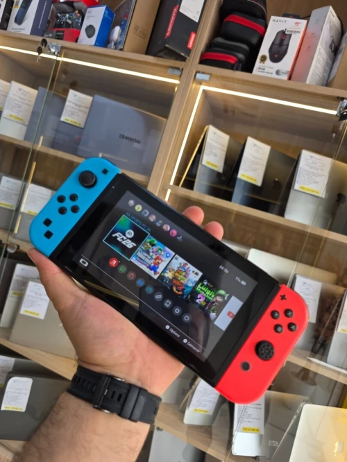 Nintendo Switch V2 6.2"  2020 Flashé  + carte SD  128GB