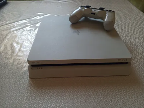 PS4 slim 1T version 13.02 d'occasion à Vendre