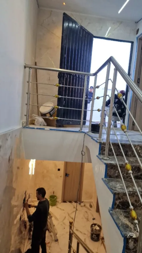Rampes d'escalier en inox & cabine de douche