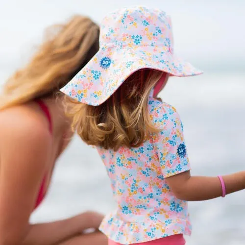 Chapeau decathlon Anti UV Bébé Réversible Rose Clair et Bleu Palmier