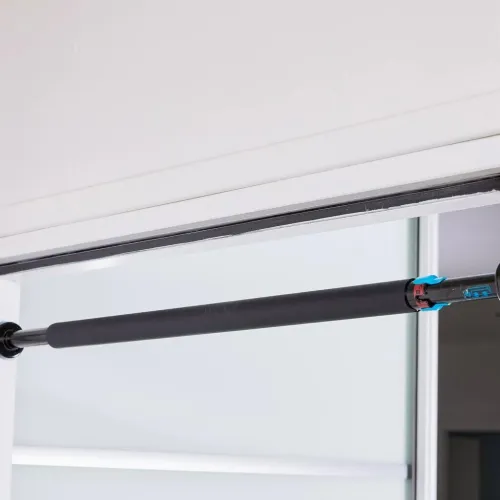 Decathlon barre de traction pour porte avec verrouillage - BT150 -70 cm  s'étend de 65 à 95cm.