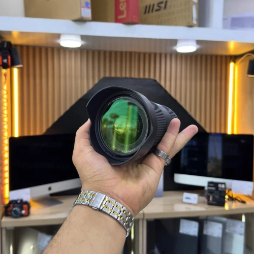 OBJECTIF CANON 16-35mm F4 Série L en excellent état avec bouchons