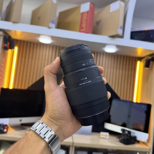 Objectif SIGMA EF-mount 70-300mm 1:4-5.6 en bon état avec bouchon