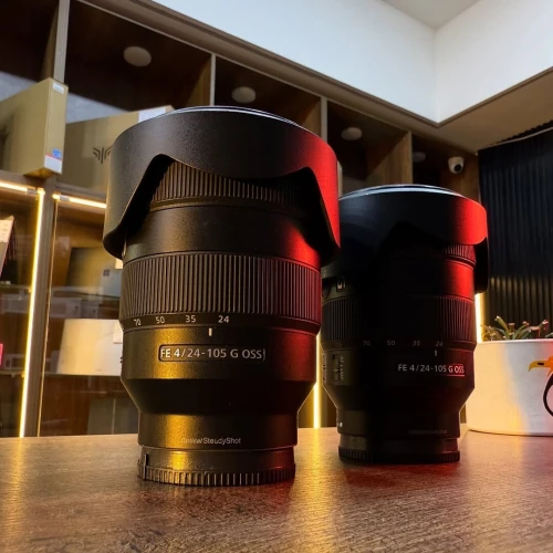 Sony 24-105 f4 g oss en excellent etat comme neuf avec deux bouchons parasoleil .