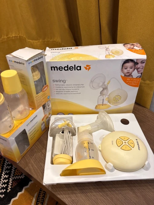 Tire-lait medela swing