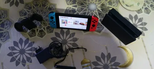 Nintendo switch 1 + tout les accessoires +un jeux (mario)