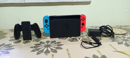 Nintendo switch 1 + tout les accessoires +un jeux (mario)