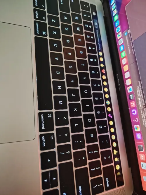 Macbook pro touchbar 2018 ramené des usa cycle de charge 40