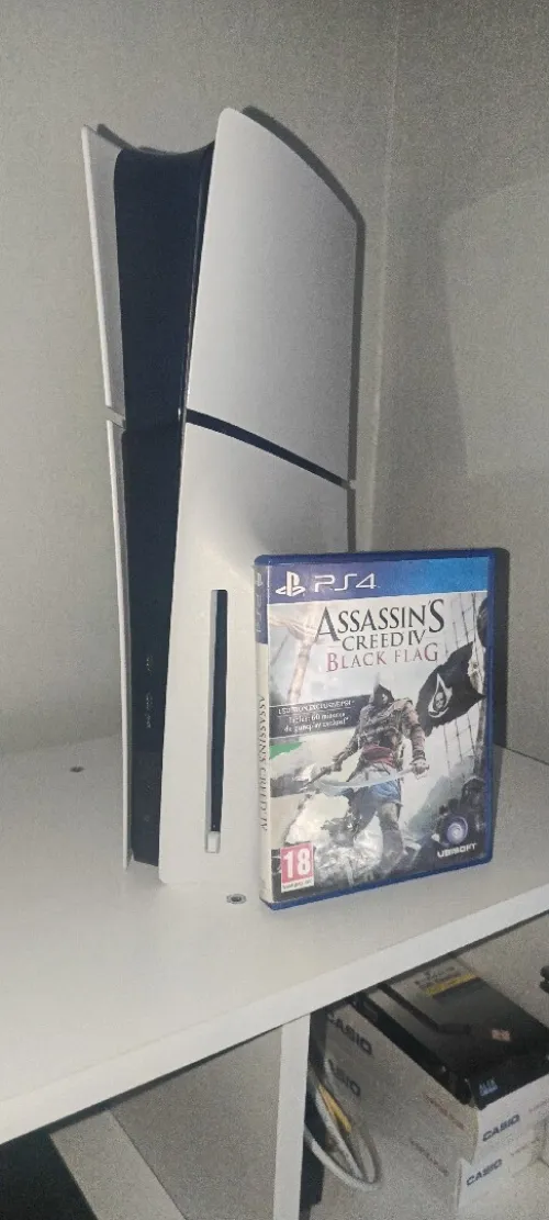 Play station 5 slim + cd assassin's creed black flag
