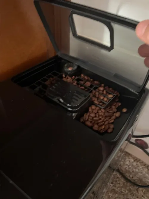 Machine à café broyeur Delongui
