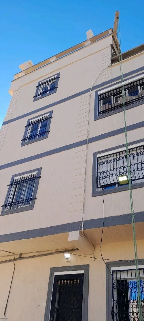 Décoration façade extérieure en monocouche