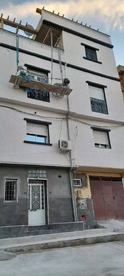 Décoration façade extérieure en monocouche