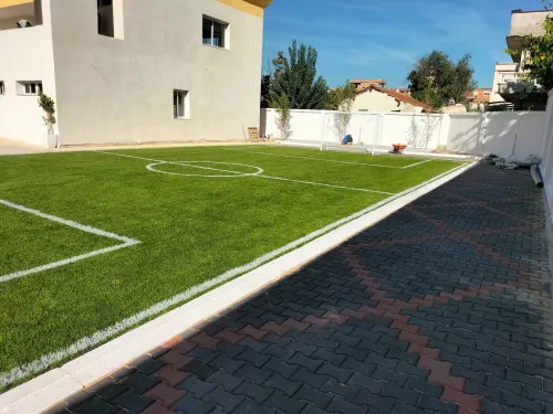 Stade matico et gazon synthétique 