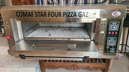 Four a gaz neuf a vendre.