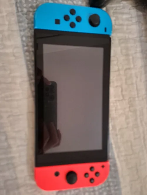NINTENDO SWICH EN EXELLENT ETAT PERET POUR LE FALASH
