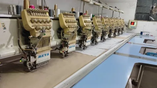 Machine broderie 6 tétes 10 tétes
