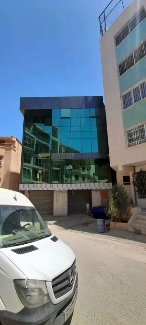 Habillage vitrine panneau publicitaire alucobonde aluco verre aluminium