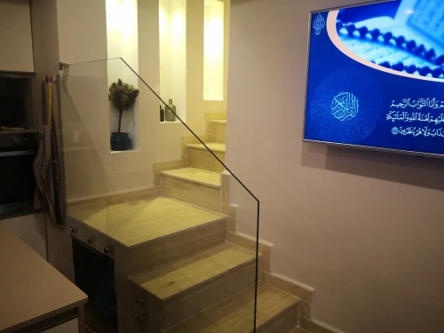 Garde corps et rampe d'escalier en verre et inox