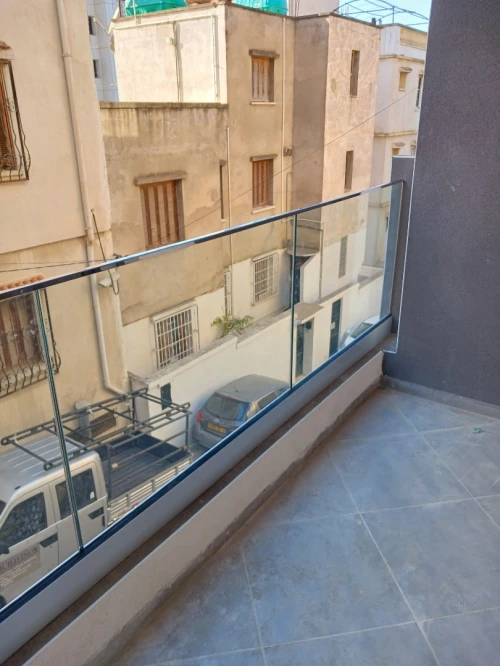 Garde corps et rampe d'escalier en verre et inox