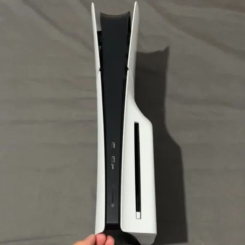 PlayStation 5 + 2 Manettes + 3 jeux